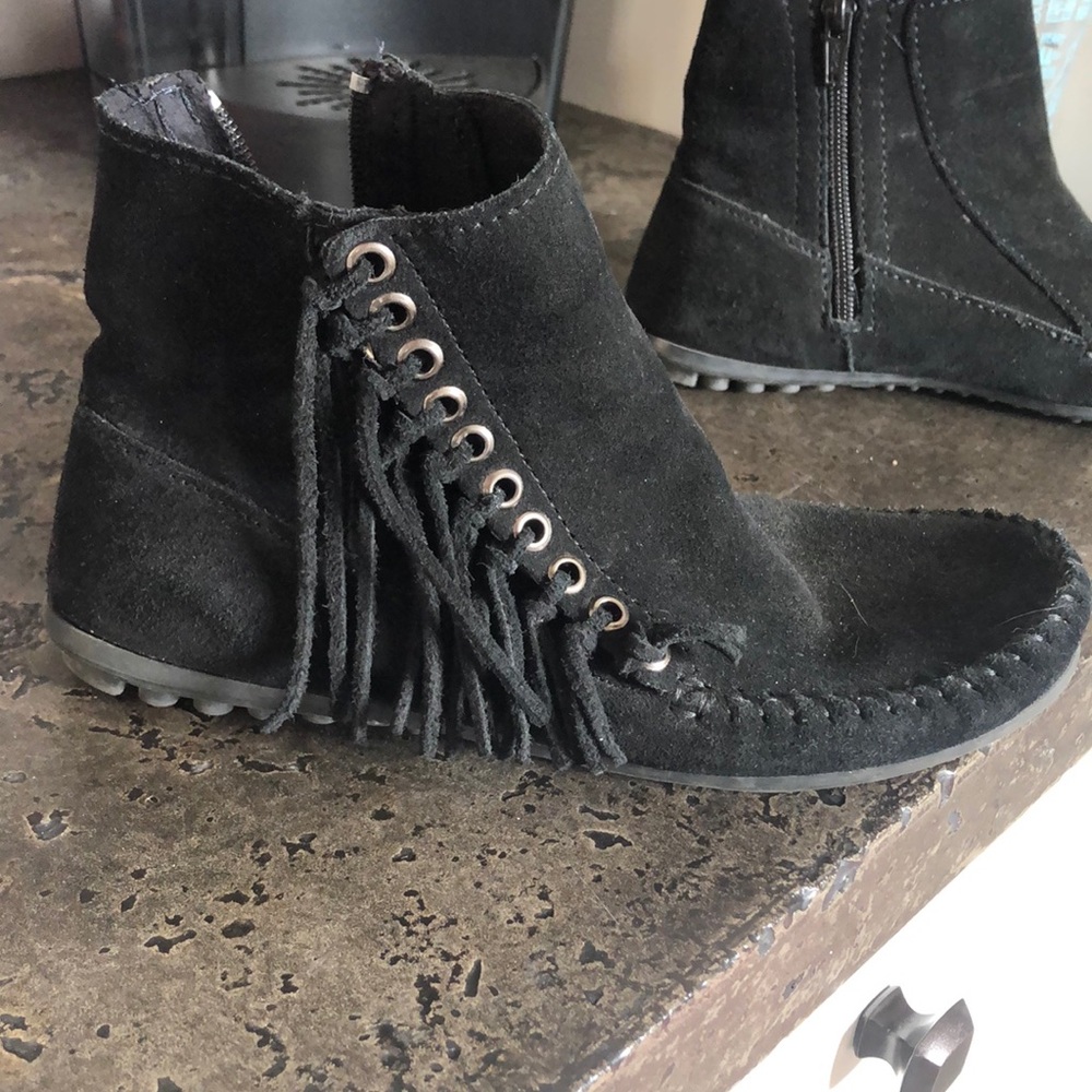Minnetonka moccasins with fringe detail